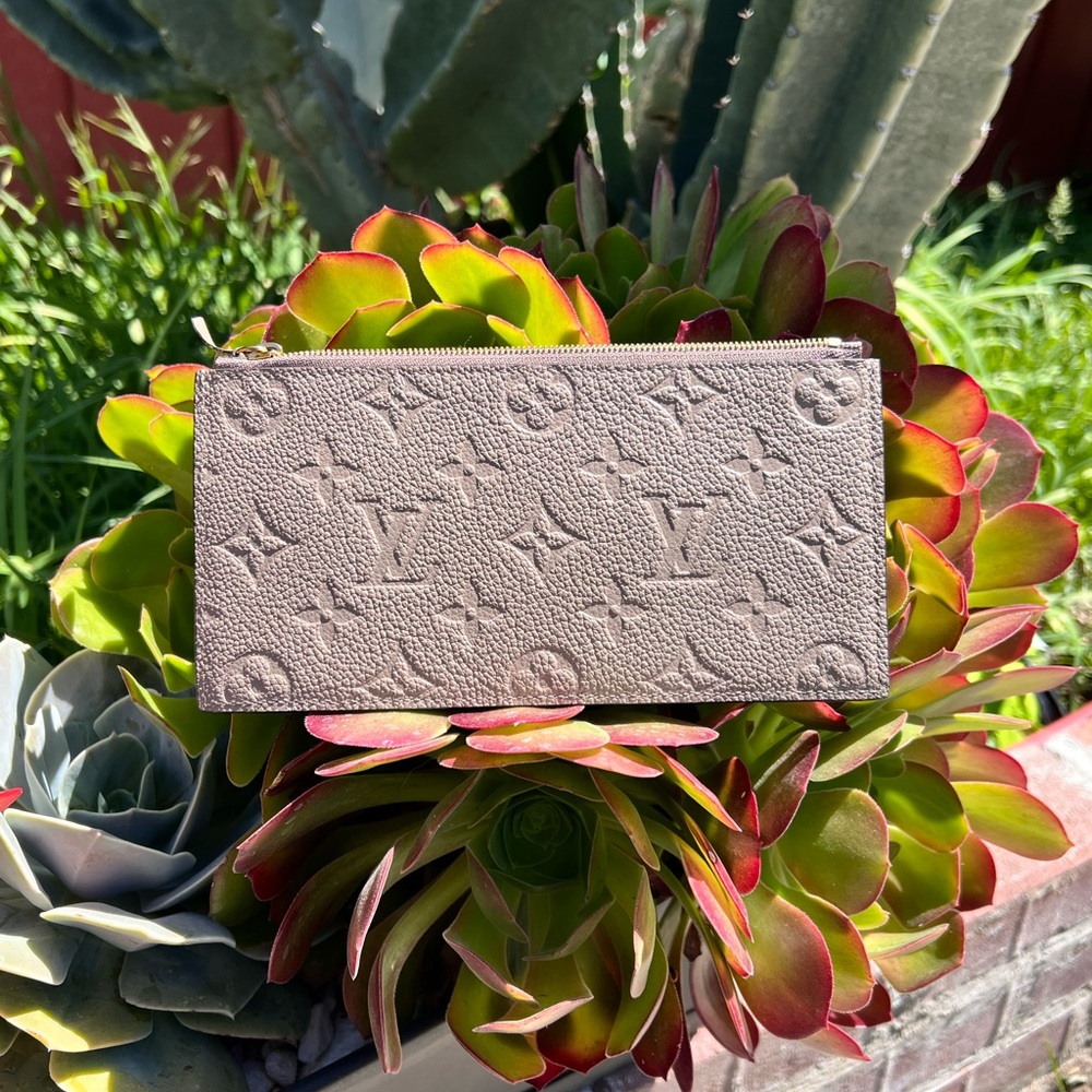Authentic Louis Vuitton zip pouch empreinte leather turtledove